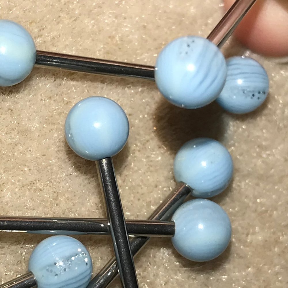 14 Gauge Light Blue, clear and glitter stripes through the design Tongue Ring